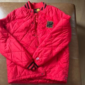 Undefeated UNDFTD red puffer jacket size medium great condition